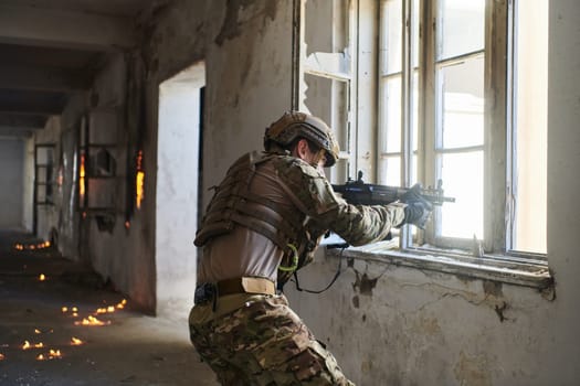 A professional soldier carries out a dangerous military mission in an abandoned building.