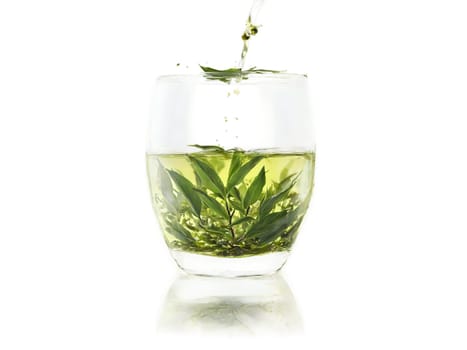 Green Tea A dynamic pour of fresh green tea into a modern glass delicate te. Drink isolated on transparent background.