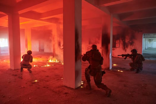 A group of professional soldiers bravely executes a dangerous rescue mission, surrounded by fire in a perilous building