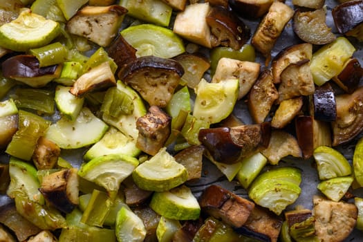 Fried eggplant, zucchini and pepper on a baking tray