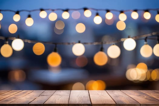 Empty wooden table with bokeh lights in blurred restaurant background.