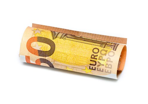 Concept of many euros: a pile of rolled 50-euro bills lying on a white background 3