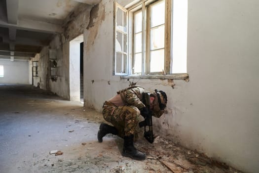 A professional soldier carries out a dangerous military mission in an abandoned building.