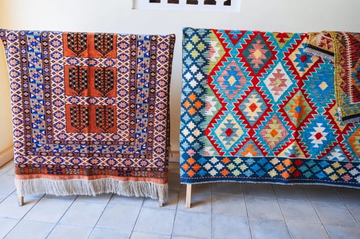 Colorful expensive vintage oriental Arabic carpets on the market in Uzbekistan