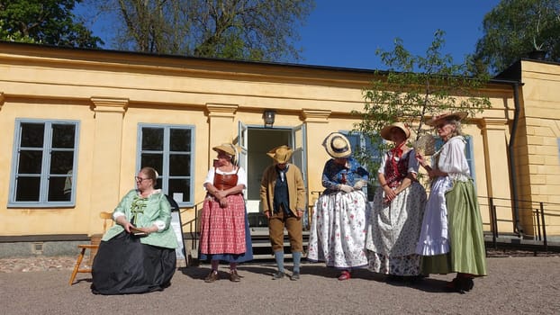 Uppsala, Sweden, May 18, 2024. A day at the Linnaeus Garden Party. 1700s theme. Waiting.