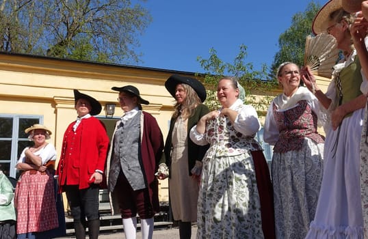 Uppsala, Sweden, May 18, 2024. A day at the Linnaeus Garden Party. 1700s theme. Waiting.