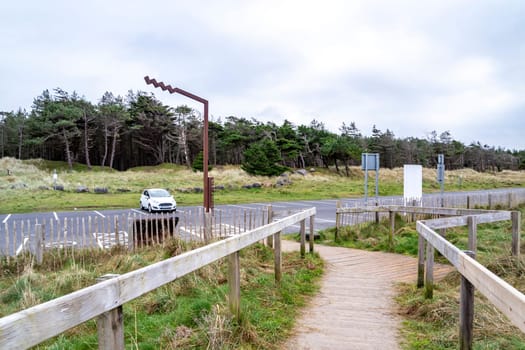 MURVAGH, COUNTY DONEGAL, IRELAND - JANUARY 21 2022 : The parking lot at the beach is almost empty.