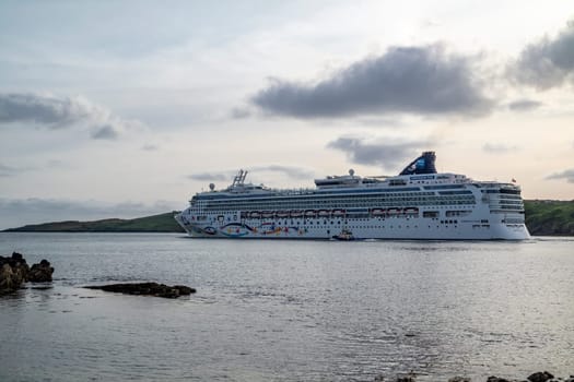 KILLYBEGS, IRELAND - MAY 16 2023: The Norwegian Star leaving after visiting Killybegs.