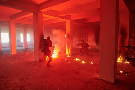 A group of professional soldiers bravely executes a dangerous rescue mission, surrounded by fire in a perilous building