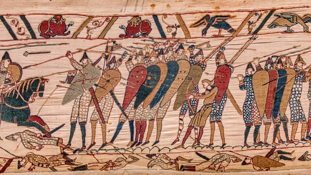 BAYEUX, FRANCE, MAY 14, 2024 : Tapestry of Bayeux, illustrate the battle of Hastings year 1066, Norman conquest of England