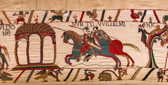 BAYEUX, FRANCE, MAY 14, 2024 : Tapestry of Bayeux, illustrate the battle of Hastings year 1066, Norman conquest of England