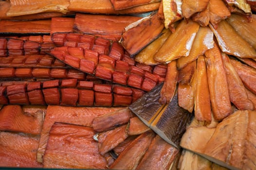 Various smoked fish products. Healthy eating and fish market concept