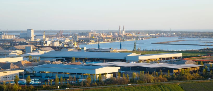 Aerial view of the industrial and port area of Ravenna ,chemical and petrochemical pole,thermoelectric,metallurgical plants and hydrocarbon refinery and liquefied natural gas tanks