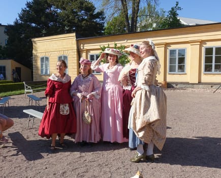 Uppsala, Sweden, May 18, 2024. A day at the Linnaeus Garden Party. 1700s theme. Pose.