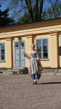 Uppsala, Sweden, May 18, 2024. A day at the Linnaeus Garden Party. 1700s theme. Lady.