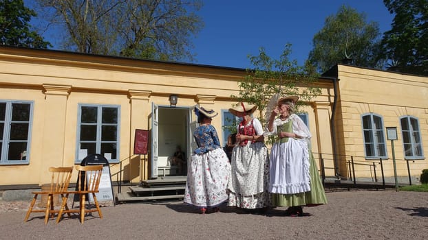 Uppsala, Sweden, May 18, 2024. A day at the Linnaeus Garden Party. 1700s theme. Talking.