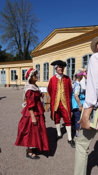 Uppsala, Sweden, May 18, 2024. A day at the Linnaeus Garden Party. 1700s theme. Book.