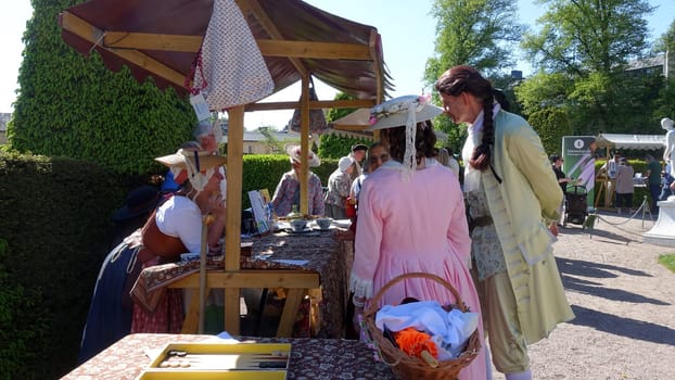 Uppsala, Sweden, May 18, 2024. A day at the Linnaeus Garden Party. 1700s theme. Market.