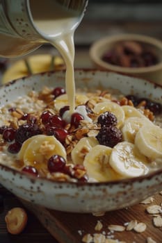 A bowl of cereal with milk poured into it. The bowl is blue and has a design on it. There are strawberries and nuts in the bowl