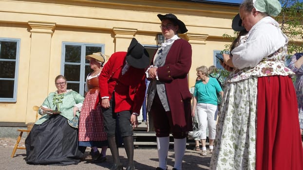 Uppsala, Sweden, May 18, 2024. A day at the Linnaeus Garden Party. 1700s theme. Waiting.