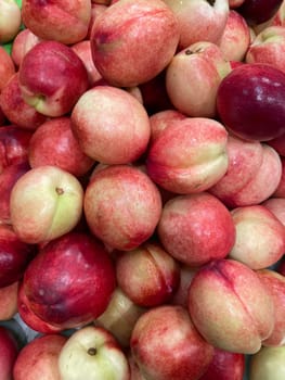 lots of fruit vitamin peaches for food as background