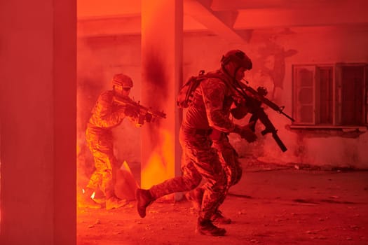 A group of professional soldiers bravely executes a dangerous rescue mission, surrounded by fire in a perilous building