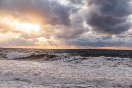 landscape storm on sea and sunset with clouds