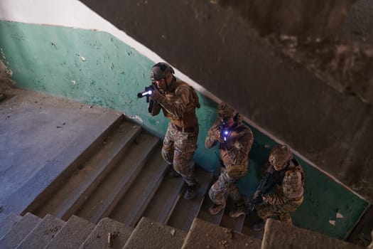 A group of professional soldiers bravely executes a dangerous rescue mission, surrounded by fire in a perilous building