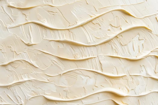 Delicate waves and swirls on a white frosting texture, abstract background for baking, food, and beauty concepts