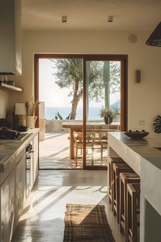 A kitchen in a house with hardwood flooring, a sliding glass door, and a view of the ocean. The wood stain adds warmth to the space