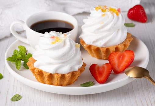 Cake basket and coffee in a plate for breakfast.