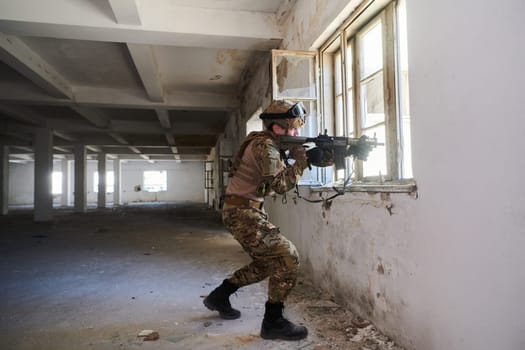 A professional soldier carries out a dangerous military mission in an abandoned building.