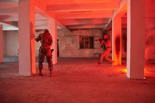 A group of professional soldiers bravely executes a dangerous rescue mission, surrounded by fire in a perilous building