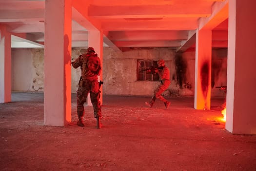 A group of professional soldiers bravely executes a dangerous rescue mission, surrounded by fire in a perilous building