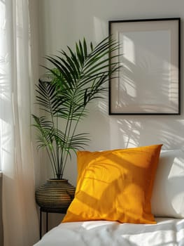 A bed with two pillows, one of which is yellow and the other is green. The bed is in a room with a white wall and a black frame. There is a potted plant in the room