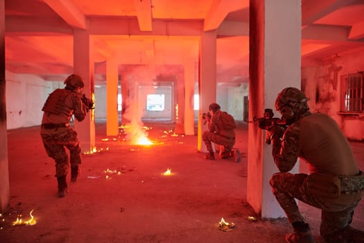 A group of professional soldiers bravely executes a dangerous rescue mission, surrounded by fire in a perilous building