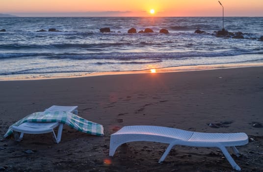 Sun loungers stand on the shore near the Mediterranean Sea 1