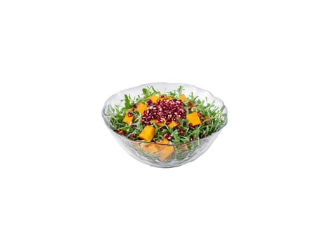 Salad roasted butternut squash with arugula and pomegranate seeds served in a transparent glass bowl. Food isolated on transparent background.