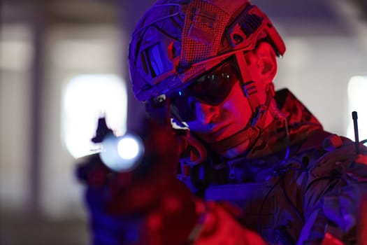 A professional soldier undertakes a perilous mission in an abandoned building illuminated by neon blue and purple lights.