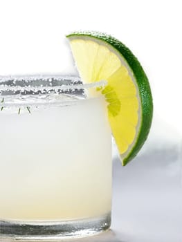 Margarita A classic mix of tequila lime juice and triple sec in a salt rimmed. Drink isolated on transparent background.