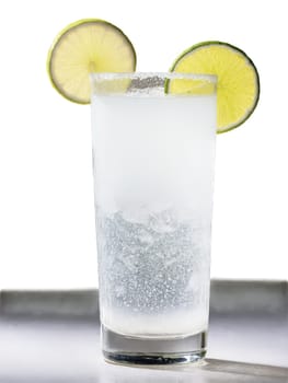 Gin Fizz Clear fizzy cocktail in a tall slender glass garnished with a slice. Drink isolated on transparent background.