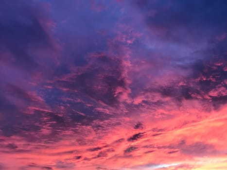 Dusk, Sunset Sky Clouds in the Evening with colorful Orange, Yellow, Pink and red sunlight and Dramatic storm clouds on Twilight sky, High quality photo