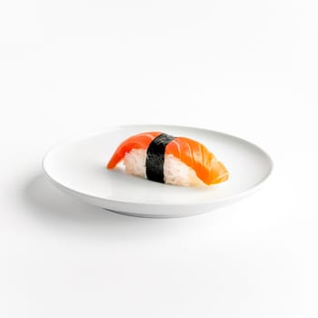 Sushi on a white Japanese plate on a white background. Japanese food.