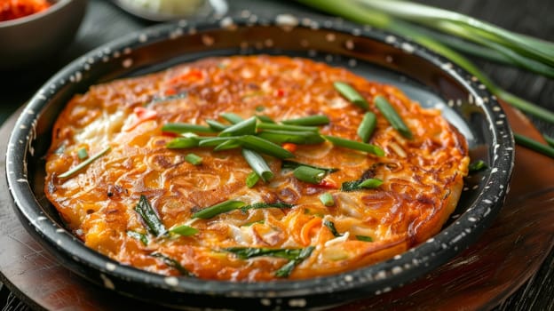 South Korean haemul pajeon, a seafood pancake with scallions, served on a ceramic dish. A traditional and flavorful dish from Korea