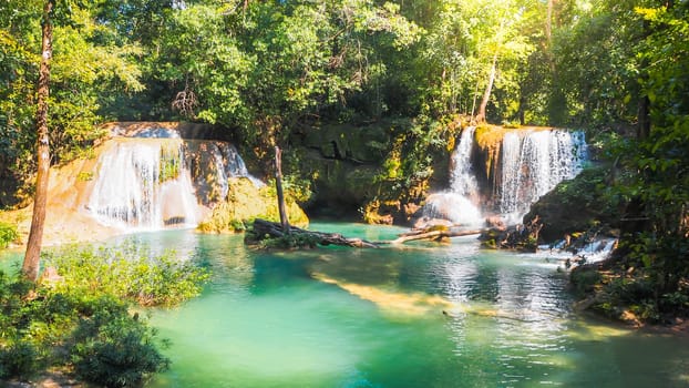 Impressive summer background. Waterfalls on a turquoise water lake. High quality photo