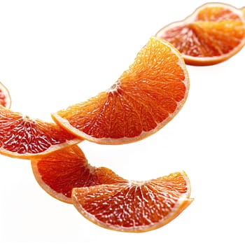 Dried grapefruit peel strips pale yellow with a slightly bitter aroma undulating gently in. Food isolated on transparent background.