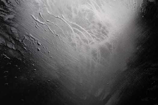 abstract black wet surface closeup full-frame background