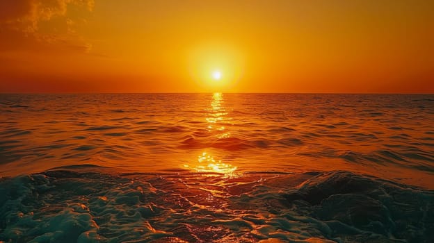 The sun is setting over the ocean, casting a warm glow on the water. The sky is a mix of orange and pink hues, creating a serene and peaceful atmosphere. The water is calm