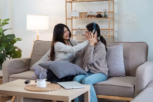 pride month. Happy woman lesbian gay lgbt couple celebrating love together during relax at home. lgbtq couple concept.