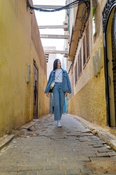 Young woman on the streets of Fez, Morocco